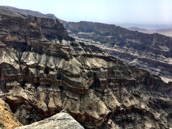 Hiking rocky (Hajar) mountains of Oman.